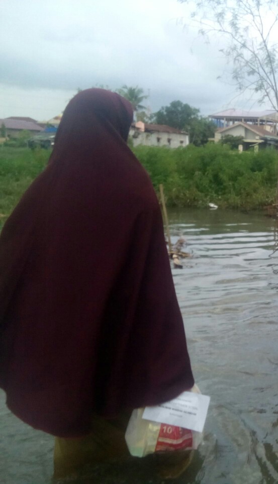 Muslimah Wahdah Respon Banjir Makassar